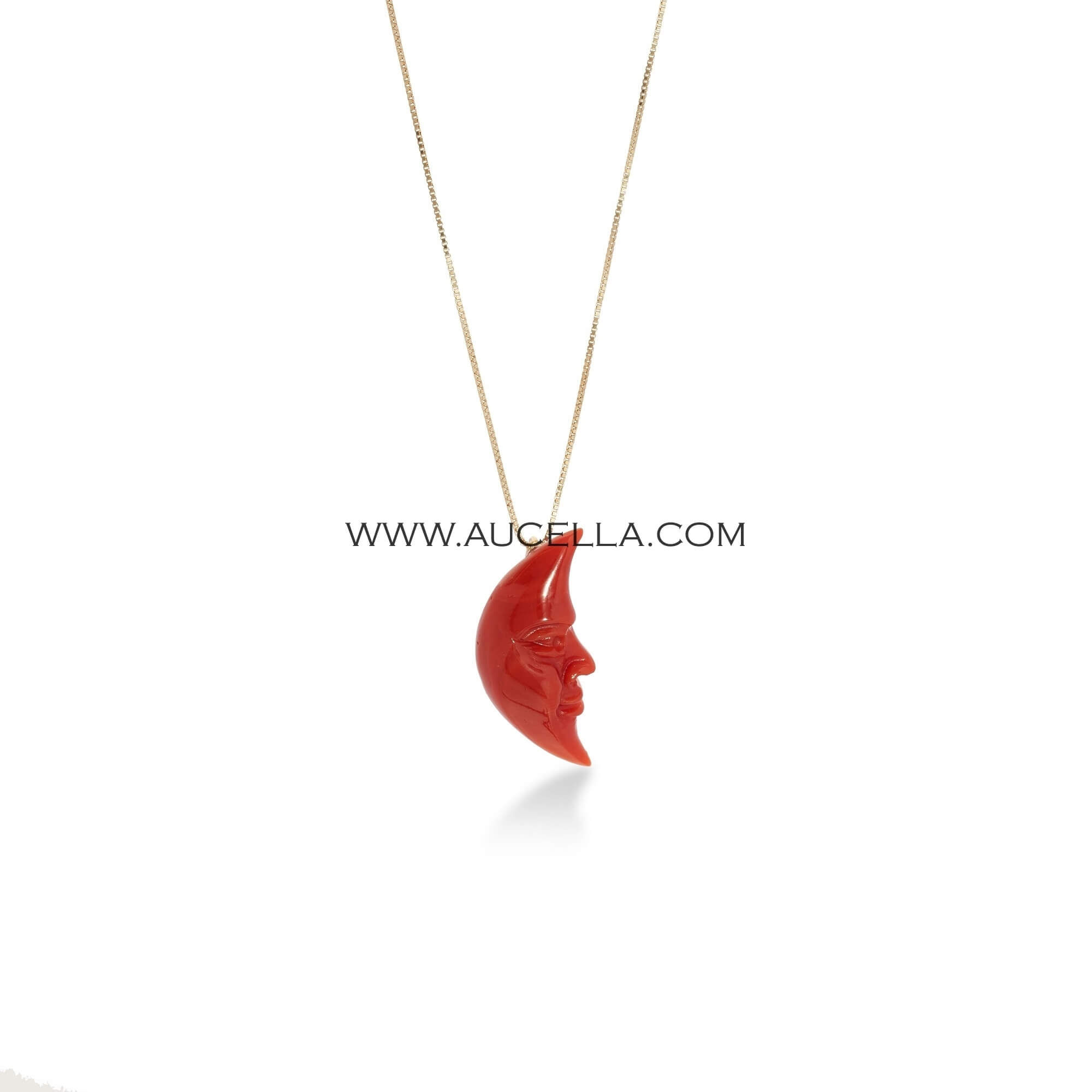 Neckalce set in gold with natural red coral carving 