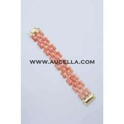 Bracelet set in gold with pink coral 