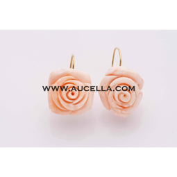 Earrings set in gold with pink coral roses