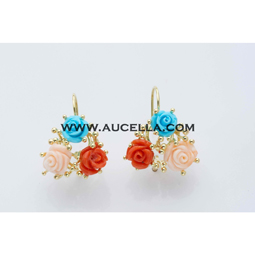 Earrings set in gold with coral and turquoise