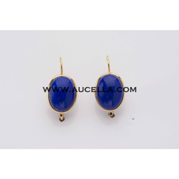 Earrings set in gold with lapis cabochon