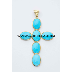 Pendant set in gold with oval turquoise cabochon