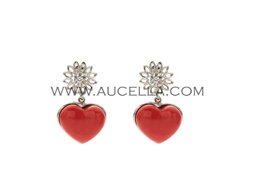 Earrings set in gold with coral hearts 