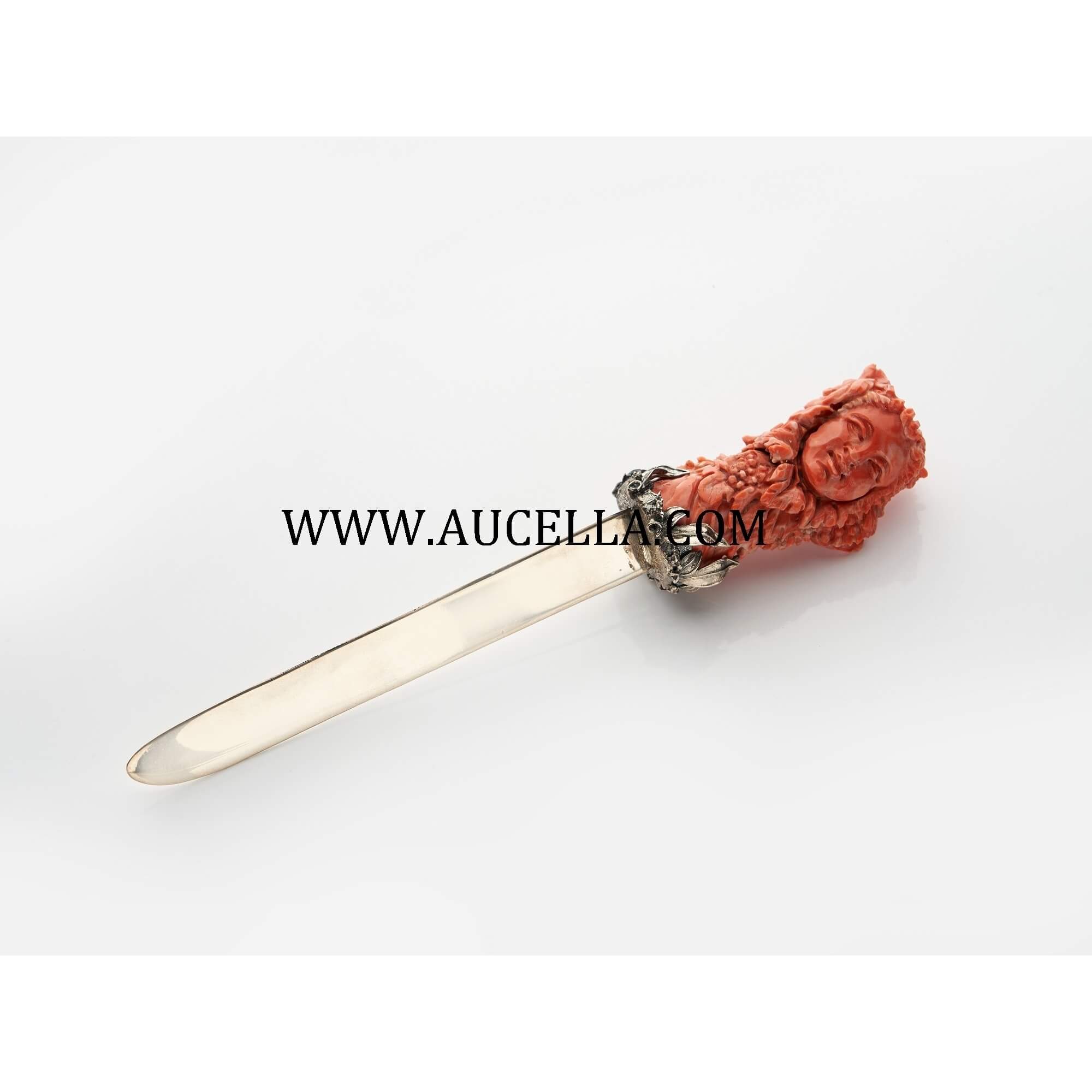 Paperknife set in silver with natural coral carving 